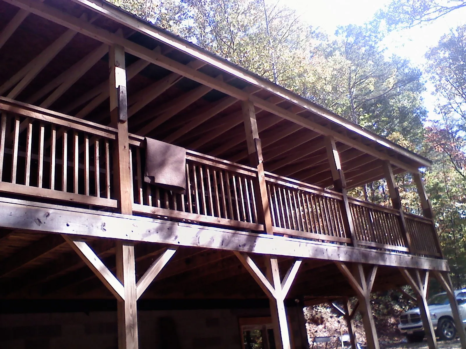 Timber framing under a new elevated porch and deck — Roof Leak Repair in Gasburg by Roofing Brothers